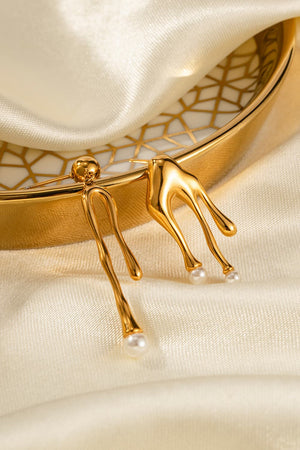 Gold abstract drip earrings with pearl accents