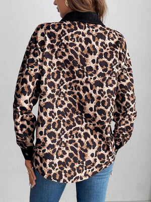 Leopard print corduroy utility shirt jacket with black collar and cuffs.