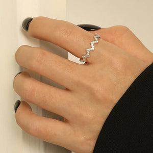 Silver zigzag pavé band ring with clear stones