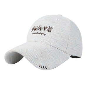 Gray cotton baseball cap with embroidered "BRAVE" text and subtle stitching details.