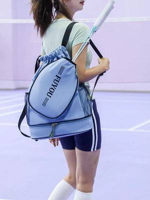 Blue drawstring backpack with racket compartment and mesh side pockets.