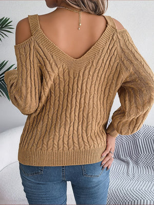 Taupe cable knit cold shoulder sweater with V-neck and balloon sleeves.