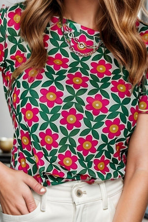 Floral tee with scallop trim and chain detail at the neckline.