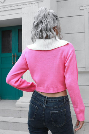 Pink cropped acrylic sweater with white collar and zip detail