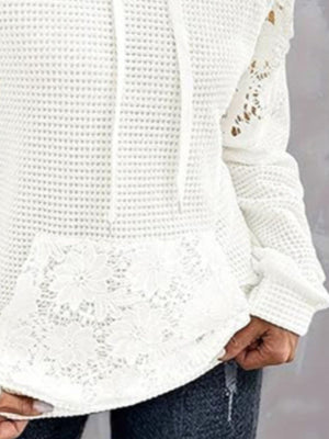 White waffle knit hoodie with lace trim pocket and sleeves.
