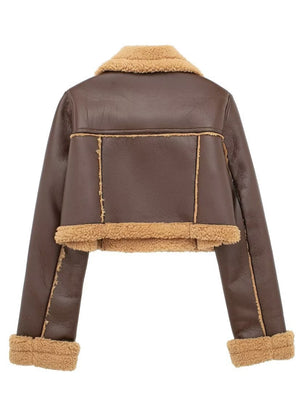 Brown cropped aviator jacket with shearling trim and collar.