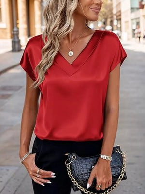 Red satin V-neck short sleeve maternity shirt with a relaxed fit.