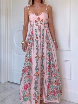 Pink sweetheart neck a-line maxi dress with floral embroidery and straps.