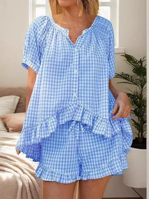 Blue gingham two-piece set with ruffle trim and button-front top.
