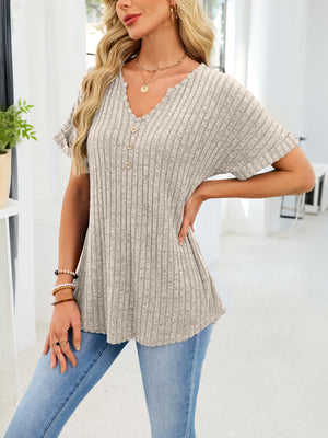 Ribbed knit short sleeve t-shirt in Khaki with decorative buttons and a curved hem.