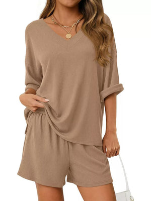 Khaki V-neck two-piece lounge set with cuffed sleeves and elastic waist shorts.