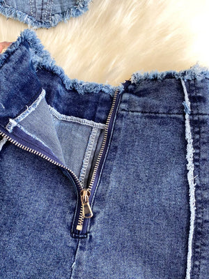 Denim cami and flare set with raw hem detail and zipper closure.