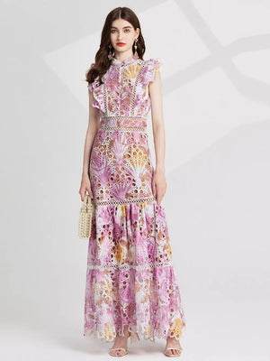 Pink purple floral lace maxi gown with cutout details and ruffled sleeves.