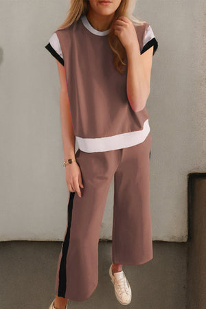 Colorblock sportswear set with contrast trim in hot pink, black, brown, or light blue.