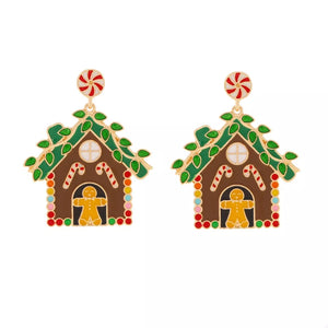 Festive gingerbread house dangle earrings with candy canes and gingerbread man detail.