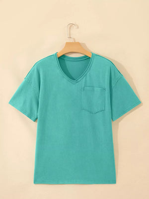 Teal mineral wash cotton v-neck t-shirt with chest pocket and raw hem detail.