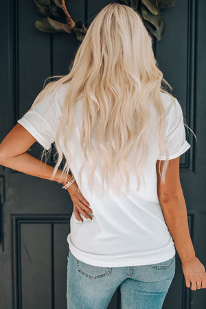 White cotton blend graphic tee with rolled sleeves, casual fit, and a relaxed neckline.