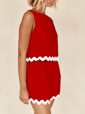 Scalloped edge tank and short co-ord set in scarlet red with white trim.