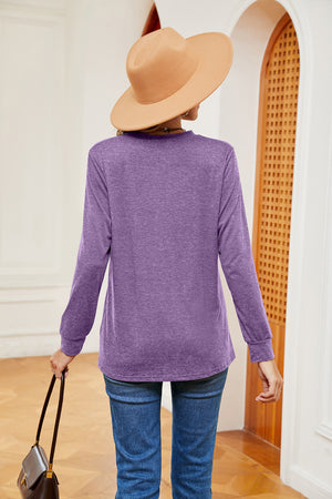 Henley-inspired long sleeve top in heathered lavender, casual crew neck, relaxed fit.
