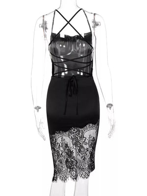 Black satin dress with lace trim hem and crisscross lace-up back detail.