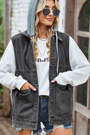 Dark denim hybrid vest with detachable grey hood, button front, and chest pockets.