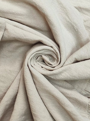 Belted ruffled hem maxi dress in khaki, showing textured fabric detail.