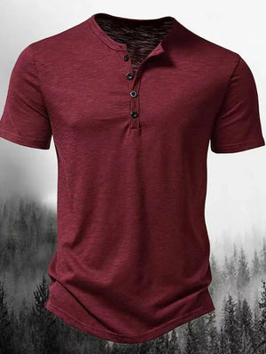 Burgundy textured henley tee with short sleeves and a button placket.