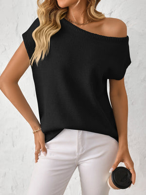 Black off-the-shoulder knit tee with short sleeves and a relaxed fit.
