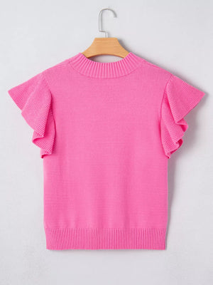 Pink knit top with mock neck and ruffled short sleeves.