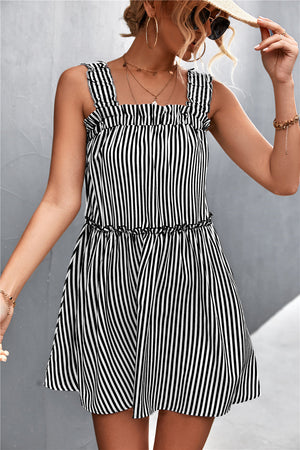 Black striped mini dress with square neckline, ruffle yoke, and elastic waist.
