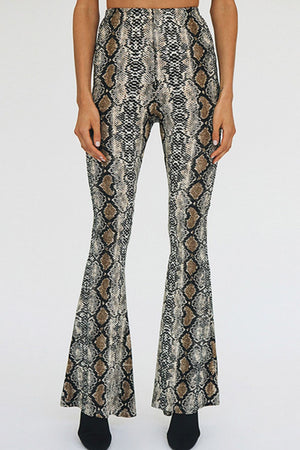 Serpentine print bell-bottom pants with a second-skin fit.