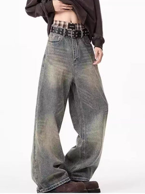 Men's belted wide-leg jeans in distressed blue cotton denim with a relaxed fit.