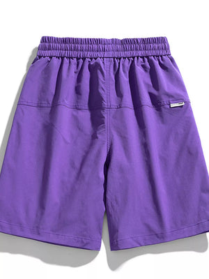 Purple relaxed fit cargo shorts with elastic waistband and back pocket detail.