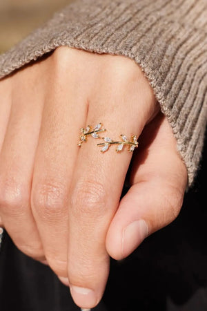Gold branching foliage open ring with cubic zirconia accents