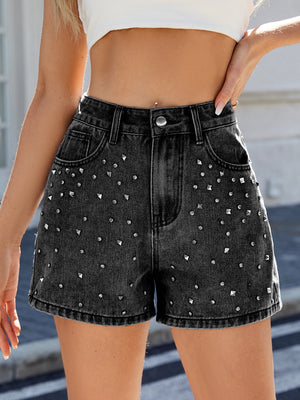 Black studded denim high-waisted cutoff shorts with a casual, comfortable fit.