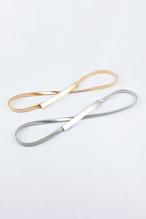 Slimline gold and silver metal waist belts with rectangular buckle detail