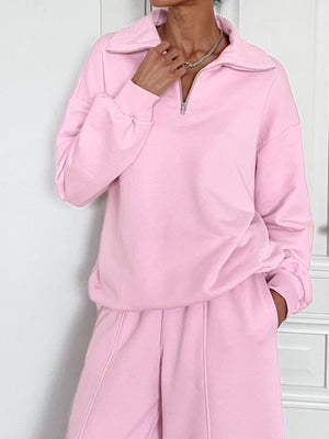 Blush pink quarter zip collared long sleeve top and pants set with a relaxed fit.