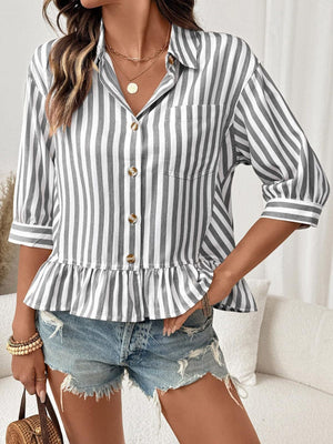 Button-down shirt with ruffle hem in gray and white stripes, 3/4 sleeves, and a collared neckline.