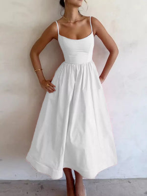 White midi dress with adjustable straps and a-line skirt