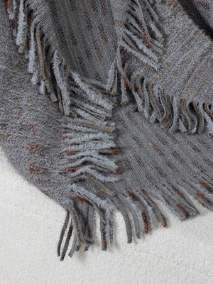 Textured fringe shawl cardigan in dark gray acrylic with subtle copper threads and fuzzy trim.