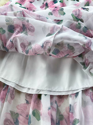 Charming floral midi dress with ruffle hem, white with pink roses, cotton blend fabric.