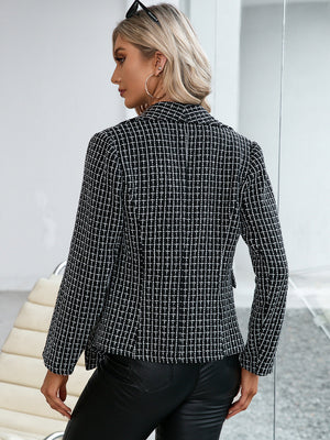 Black textured plaid double-breasted blazer with a classic fit.