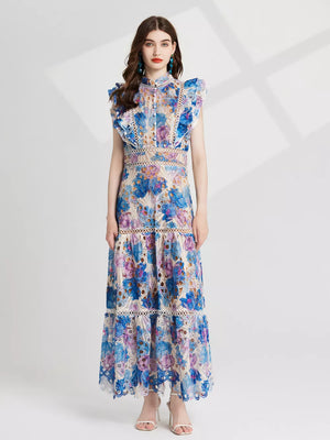 Blue and purple floral lace maxi gown with cutout details and ruffled sleeves.