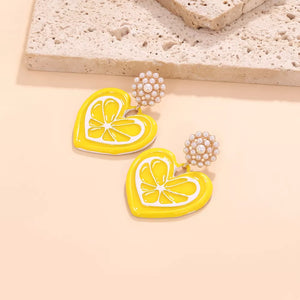Yellow heart-shaped lemon slice dangle earrings with pearl accents