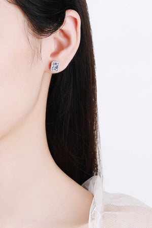 Silver emerald cut halo stud earrings with clear stones