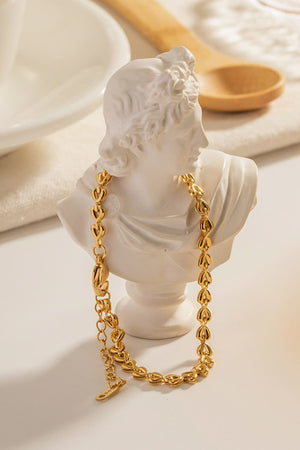 Gold linked heartbeat chain bracelet with adjustable clasp