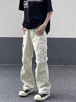 Men's relaxed fit beige cotton cargo pants with multiple pockets.