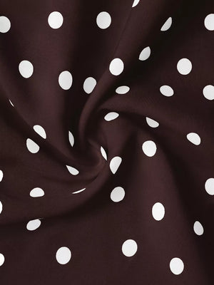 Brown polka dot camisole fabric with tie-back detail.