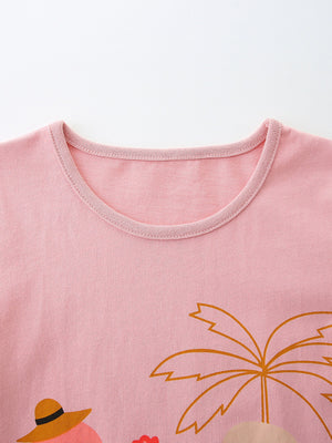 Pink cotton baby tee with flamingo and palm tree graphic.
