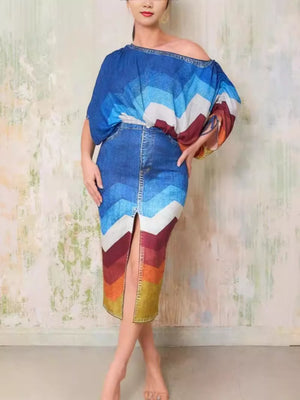 Denim asymmetrical top and slit skirt set with chevron print in blue, white, red, and yellow.